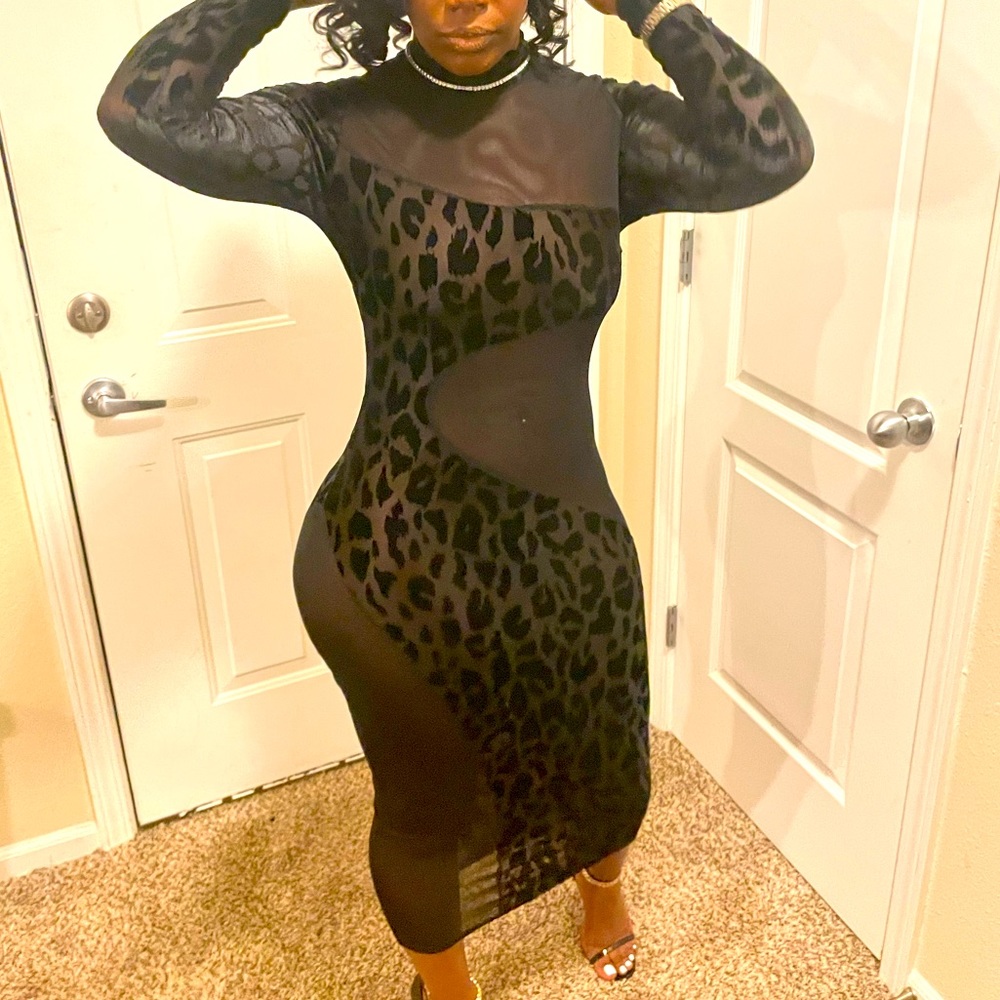 Black dress peek a boo animal print accent